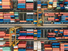 Aerial shot of a port full of shipping containers